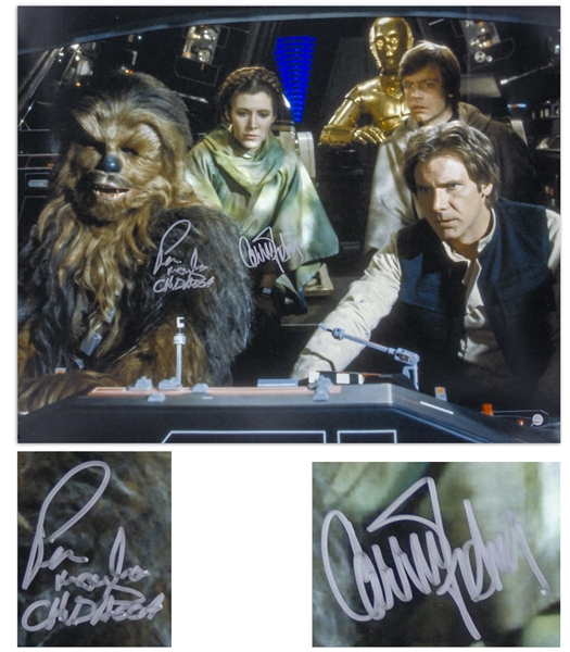 Carrie Fisher & Chewbacca's Peter Mayhew Signed 20'' x 16'' Photo From ''Star Wars'' -- With Steiner COA